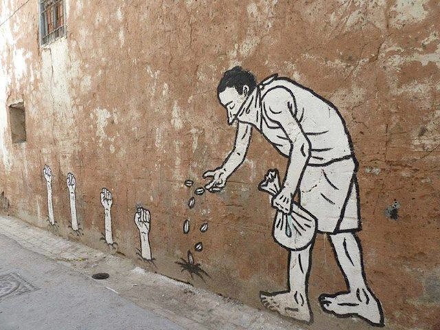 Street-Art-resistance-grows.jpeg