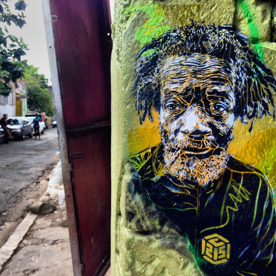 By C215 in Kingston and Nine Mile in Jamaica Street Art Utopia